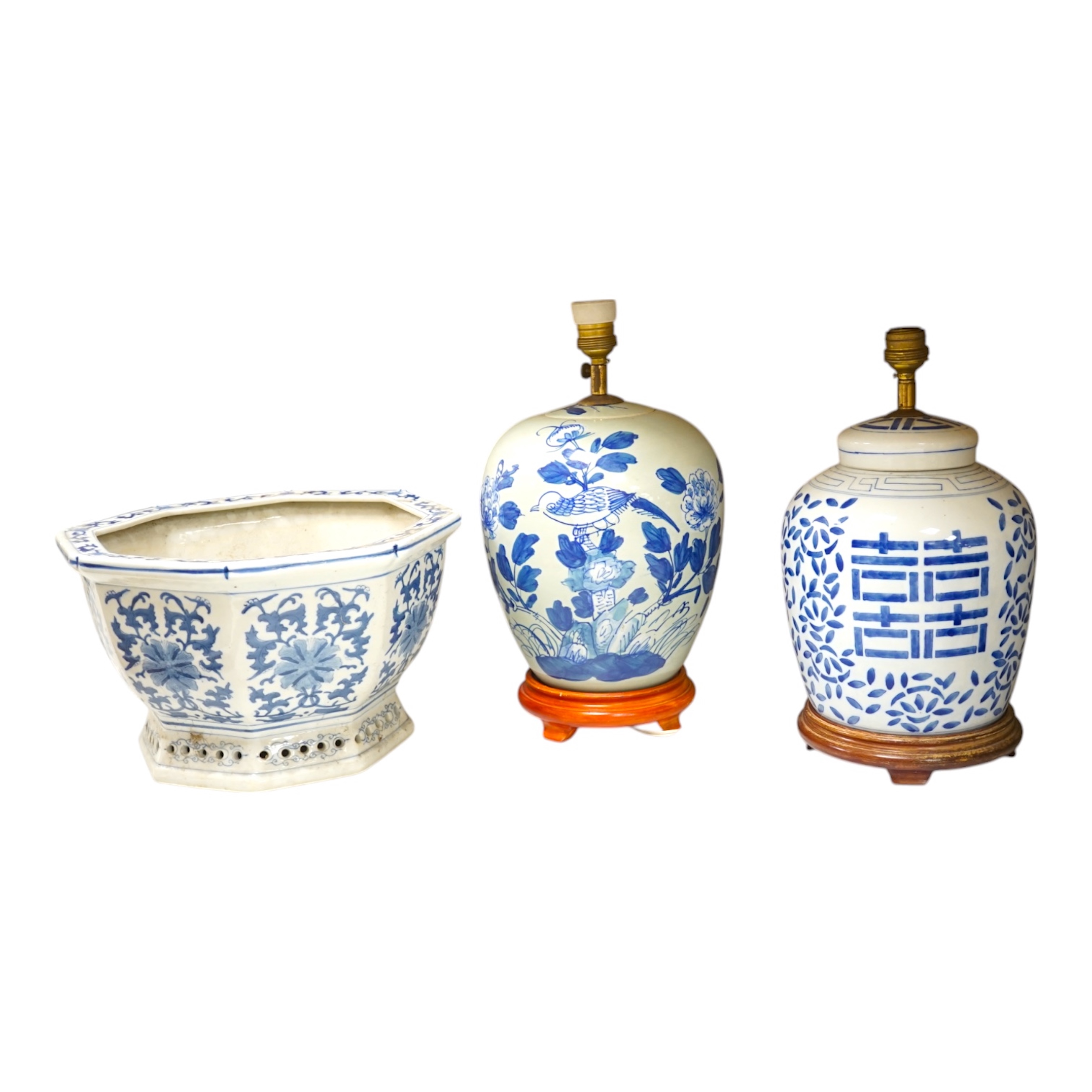 Two Chinese porcelain jars mounted as lamps and a similar blue and white octagonal jardiniere, largest 35cm wide. Condition - good (3)